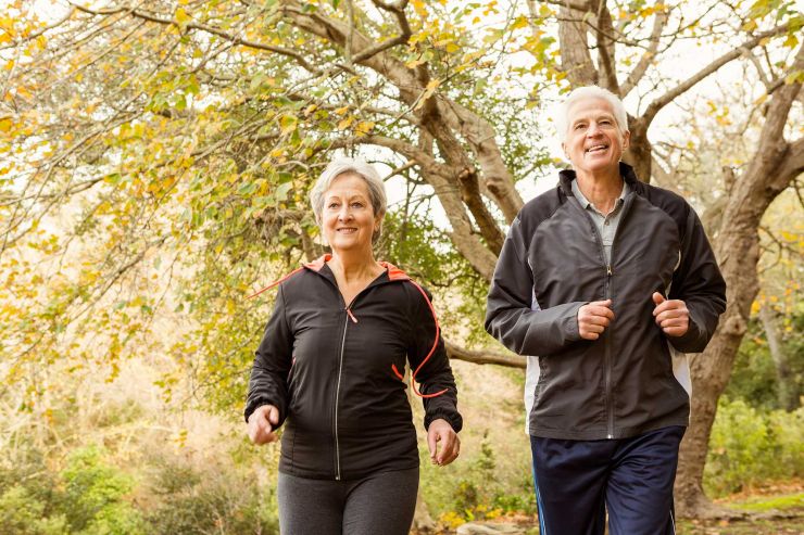 Walk Fit programme photo - a man and a woman jogging through countryside